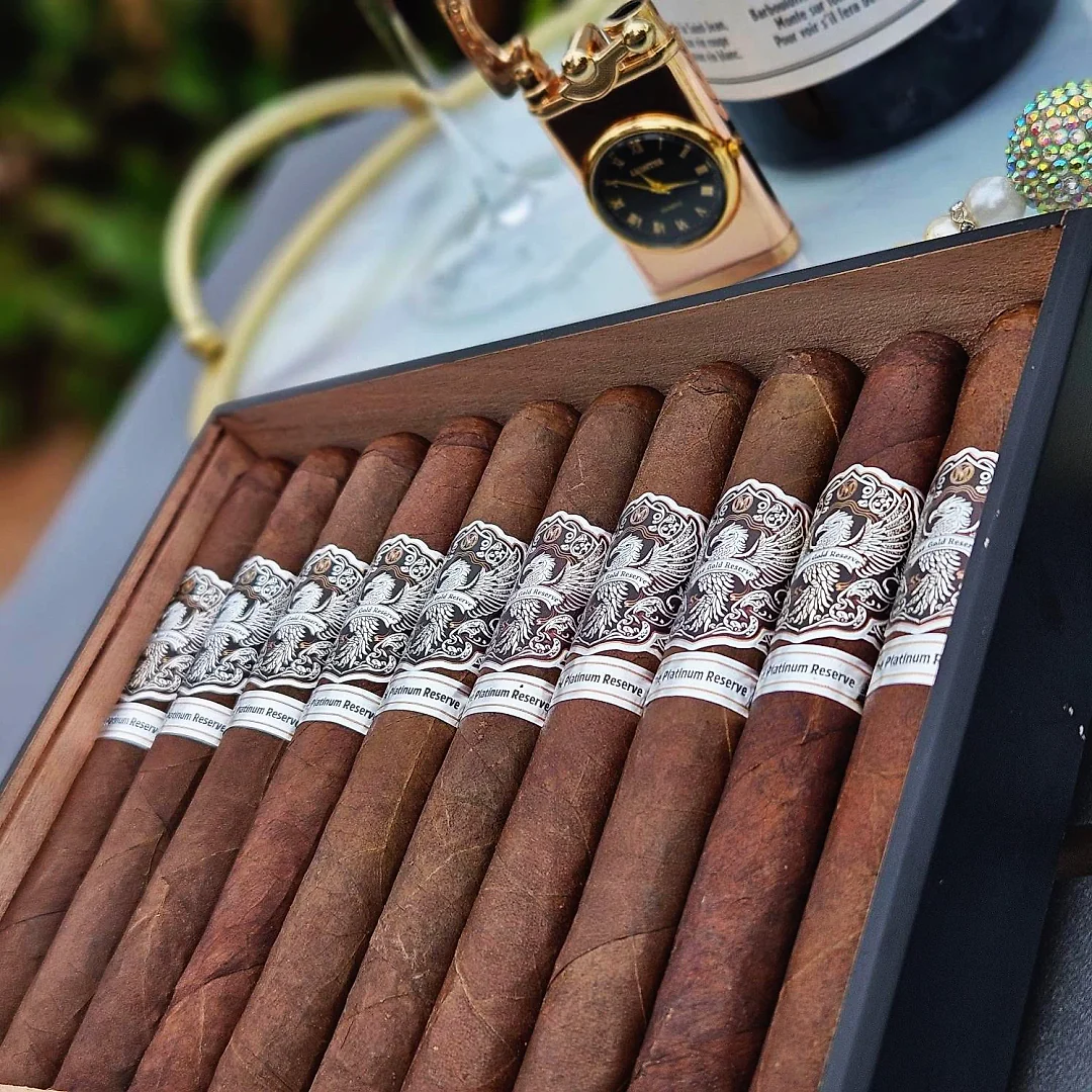 Open box of The Platinum Reserve cigars with white and platinum bands
